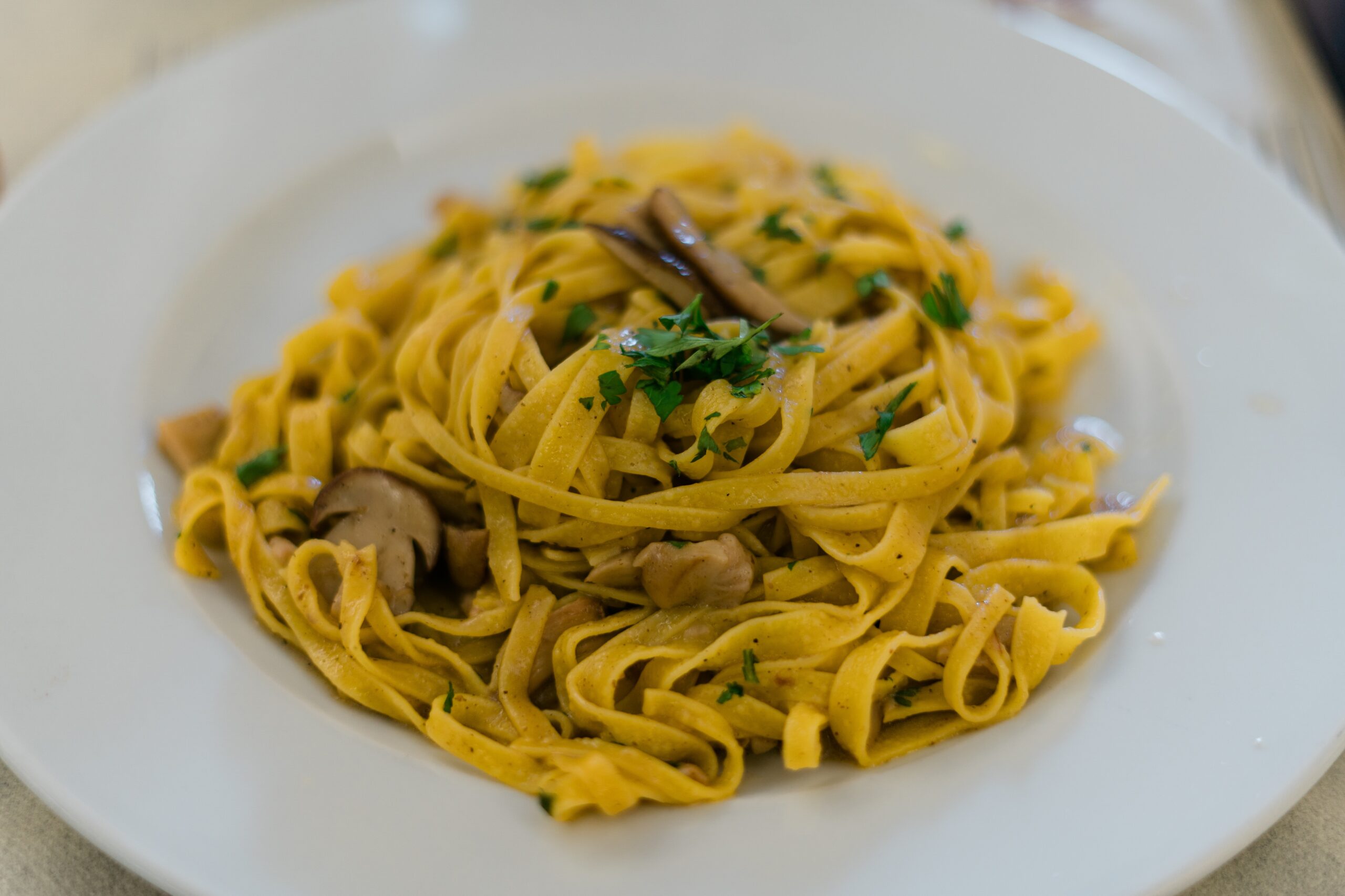 pasta dish on white ceramic plate