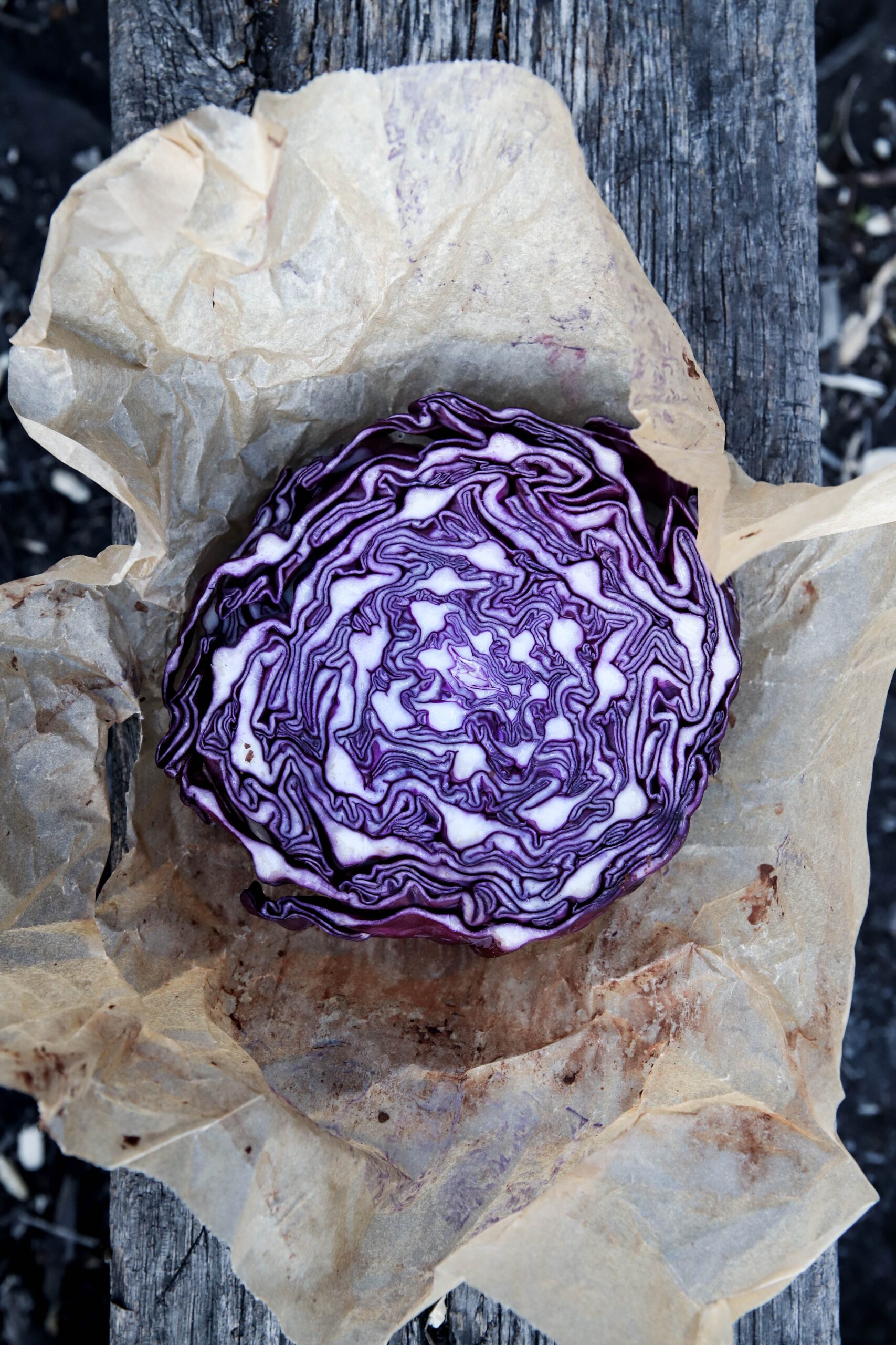 purple and white stone on white paper