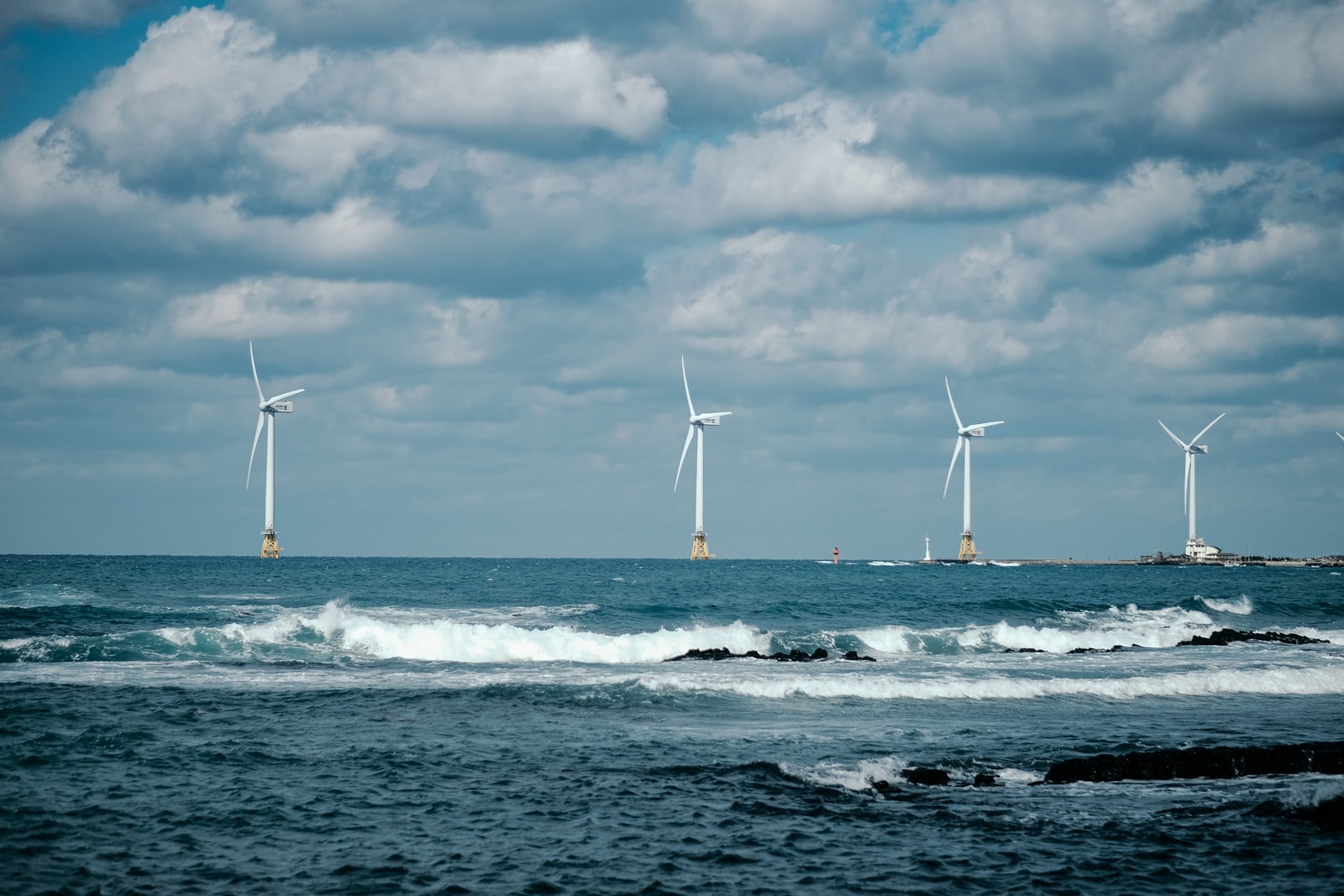 white sail boat on sea during daytime
