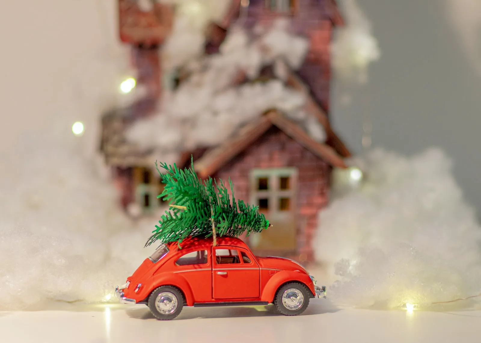red car with green pine tree on top