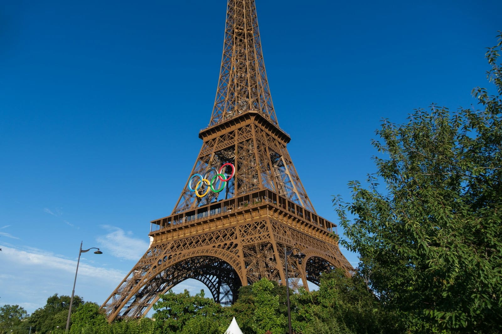 The eiffel tower is very tall and has a clock on it