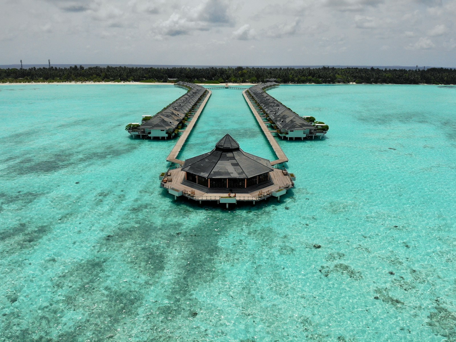 a building on a dock in the water