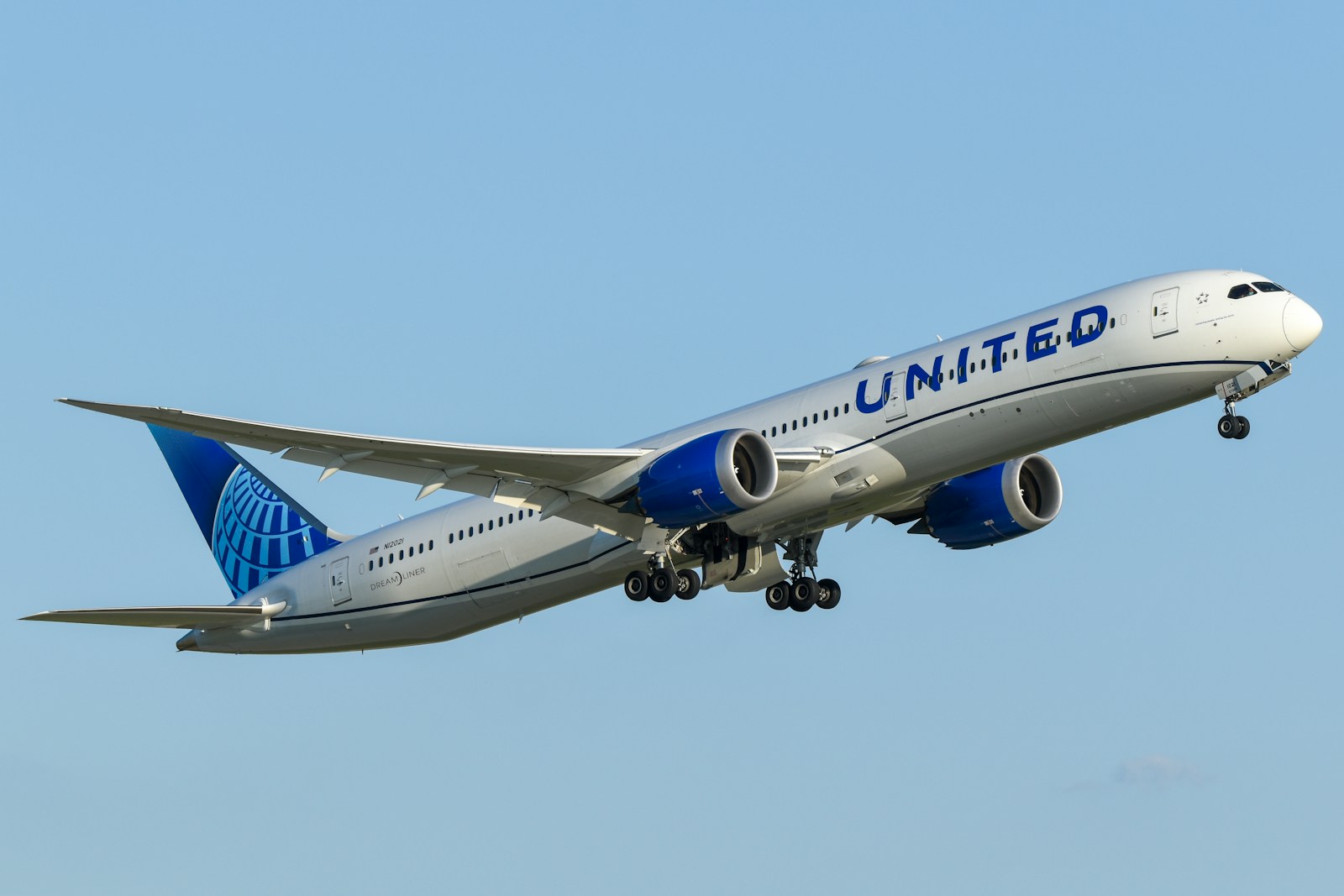 A united airlines plane flying in the sky